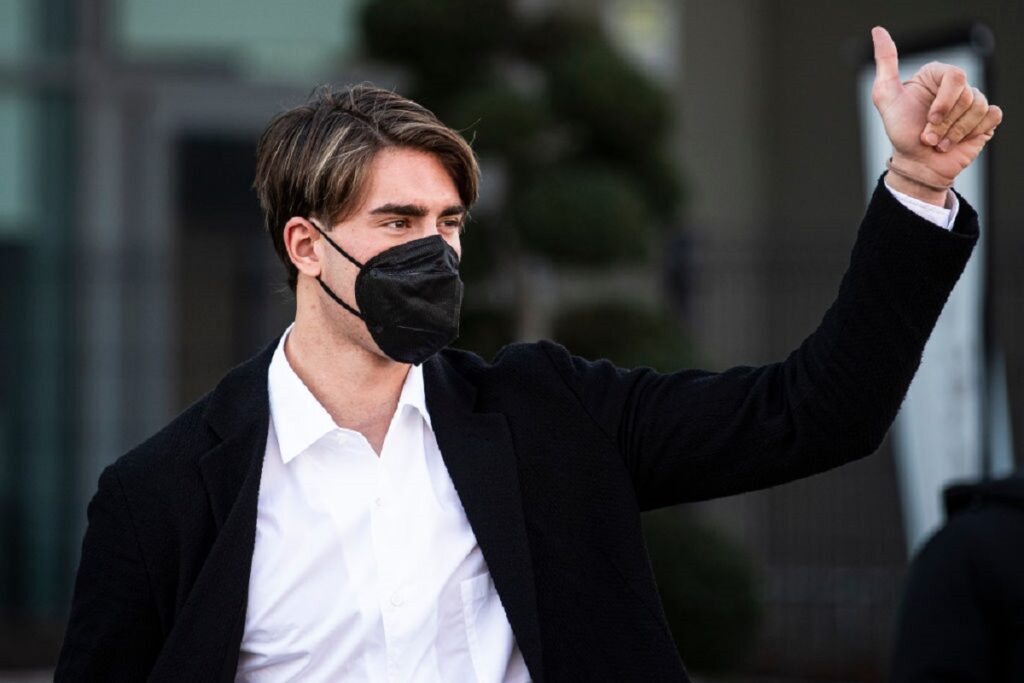 Juventus FC new signing Dusan Vlahovic gestures as he leaves