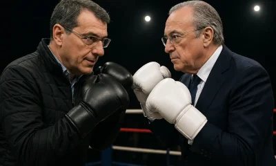 Comolli e Florentino Perez si sfidano su un ring, immagine creata con intelligenza artificiale