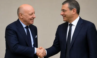 Stretta di mano tra Marotta, presidente dell'Inter, e Comolli, Ad della Juve, immagine creata con intelligenza artificiale